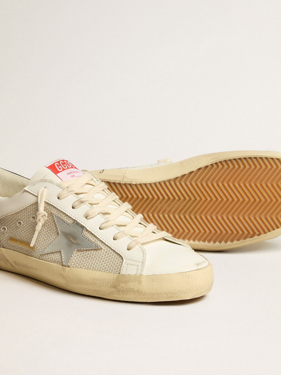 heren super-star ltd in mesh en leer met zilveren ster en blauwe hielband.