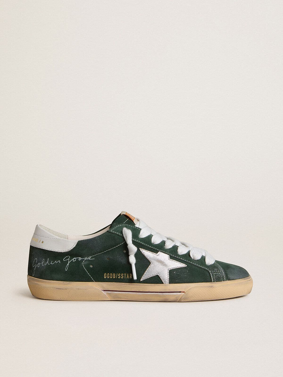 heren super-star in groen suède met zilverkleurige metallic leren ster en leren hielstuk.