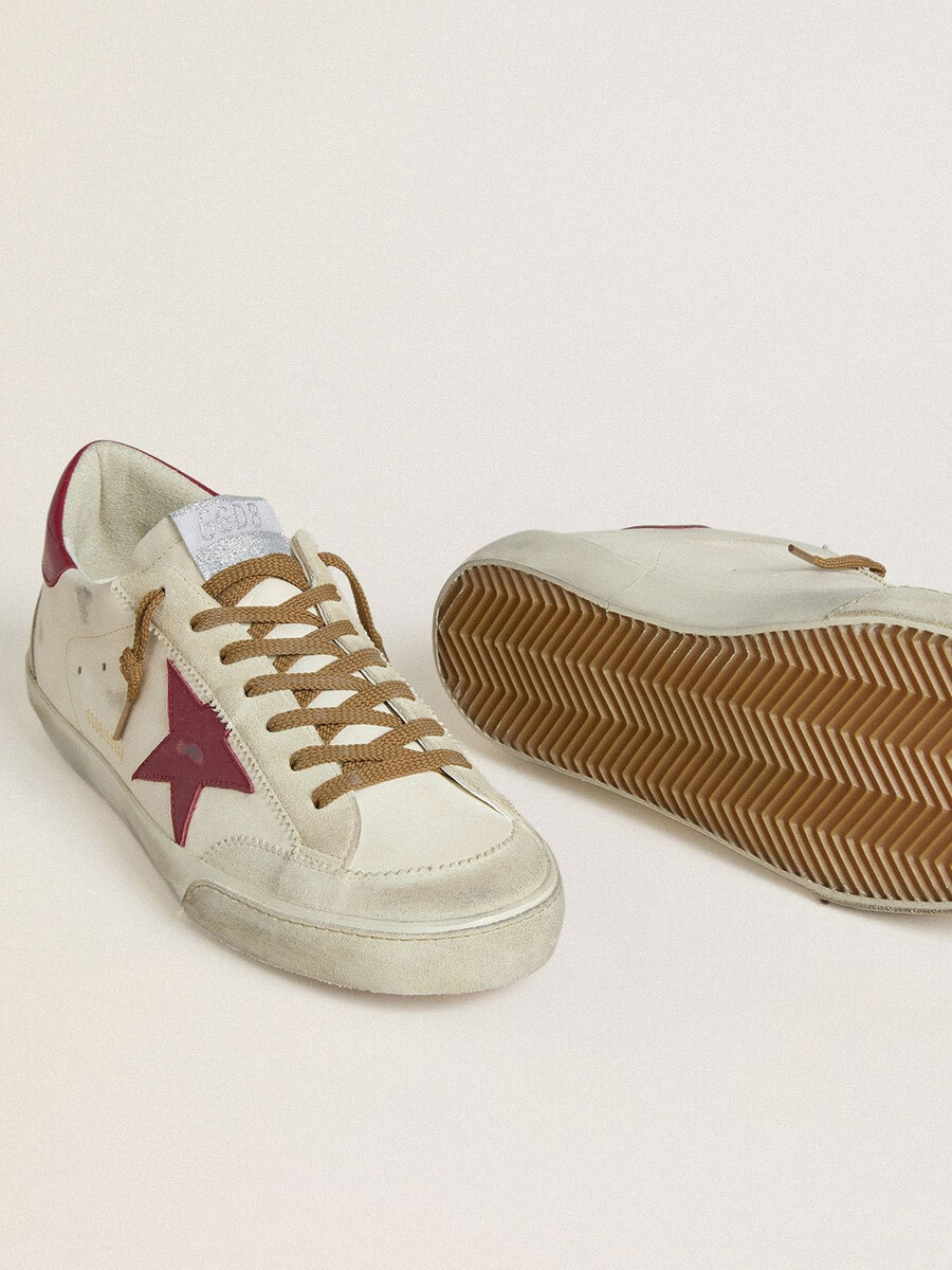 heren super-star met rode leren ster en beige suède inzetstukken.