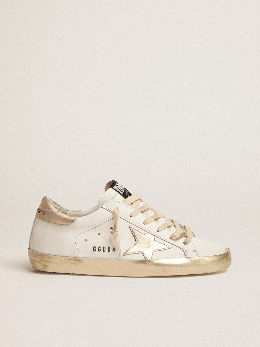 super-star sneakers voor dames met gouden rand.