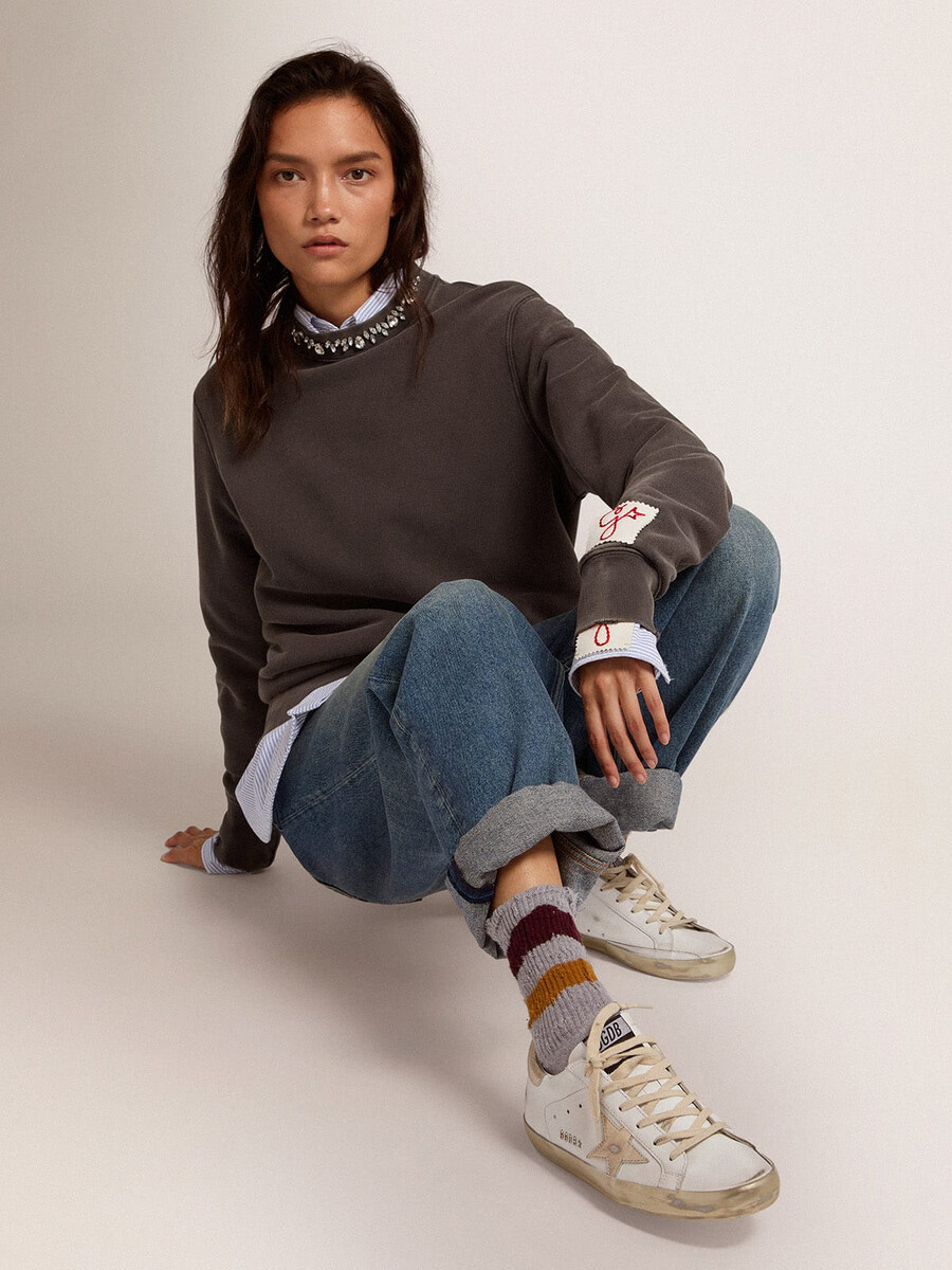 super-star sneakers voor dames met gouden rand.