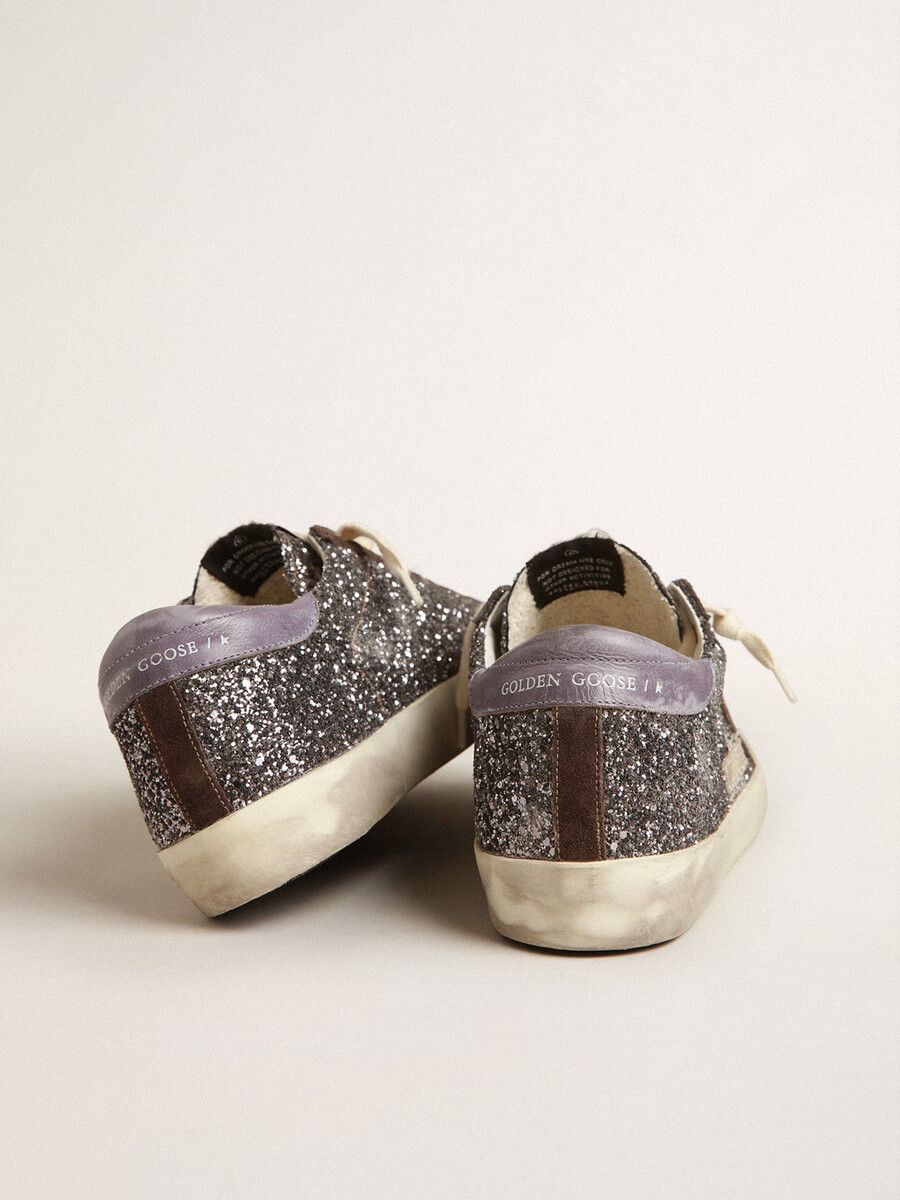 superster in glitter met een bruine ster en lila hielstukje