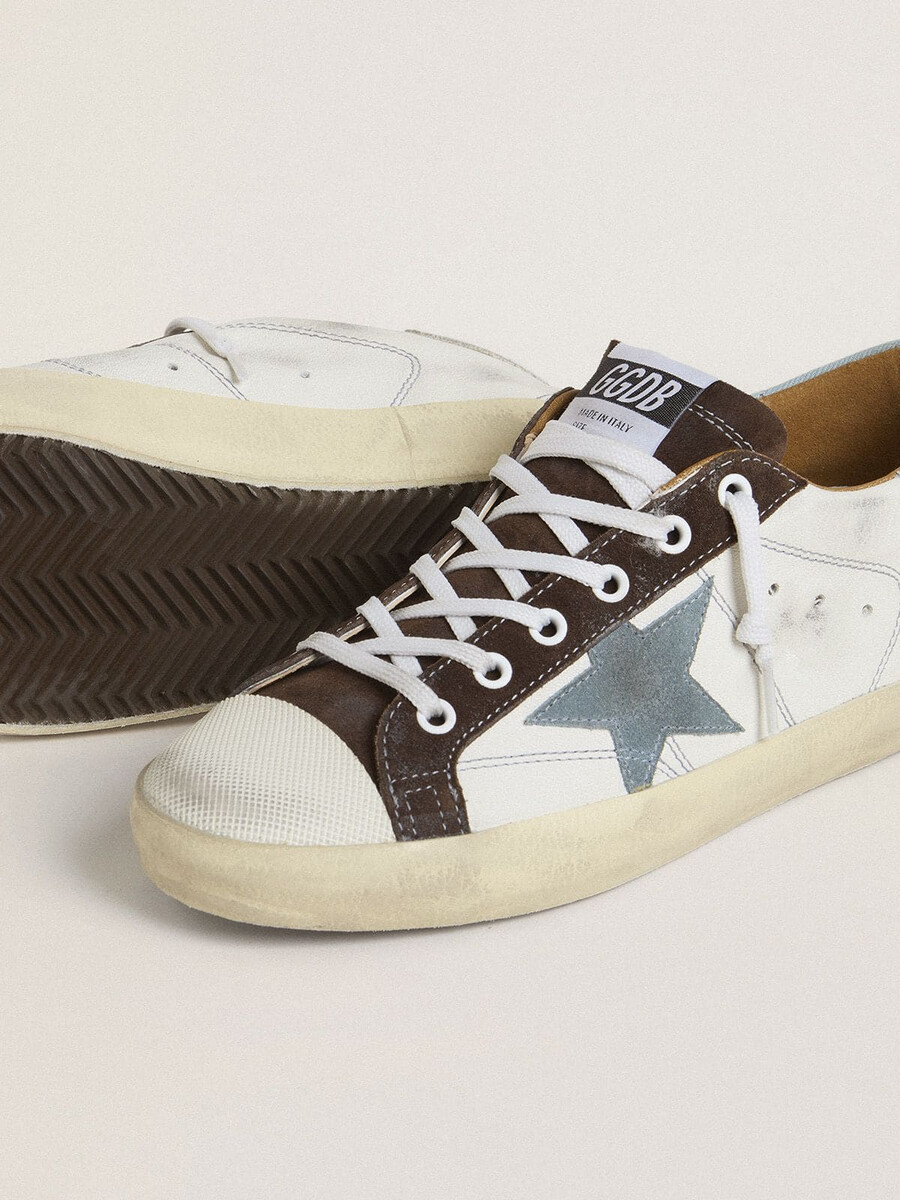 dames ltd super-star met lichtblauwe suède ster en lichtblauwe canvas hielband.