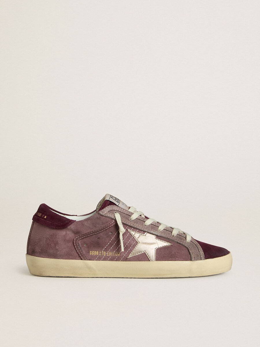 dames super-star ltd in lila suède met zilverkleurige metallic leren ster en suède hielstuk.