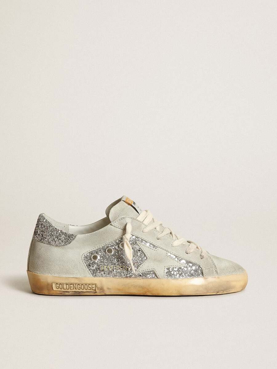 dames superster in zilverkleurige glitter met ijsgrijze ster en inzetstukken.