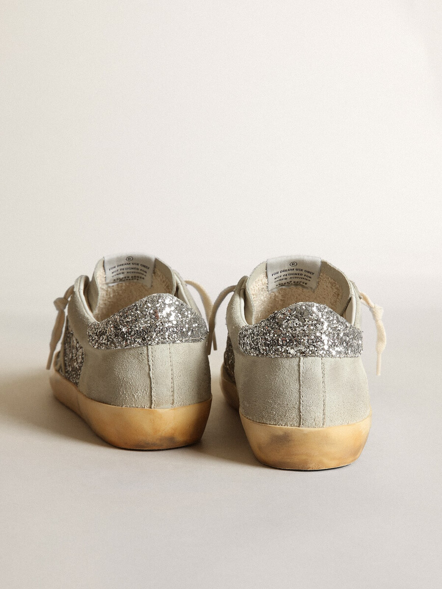dames superster in zilverkleurige glitter met ijsgrijze ster en inzetstukken.