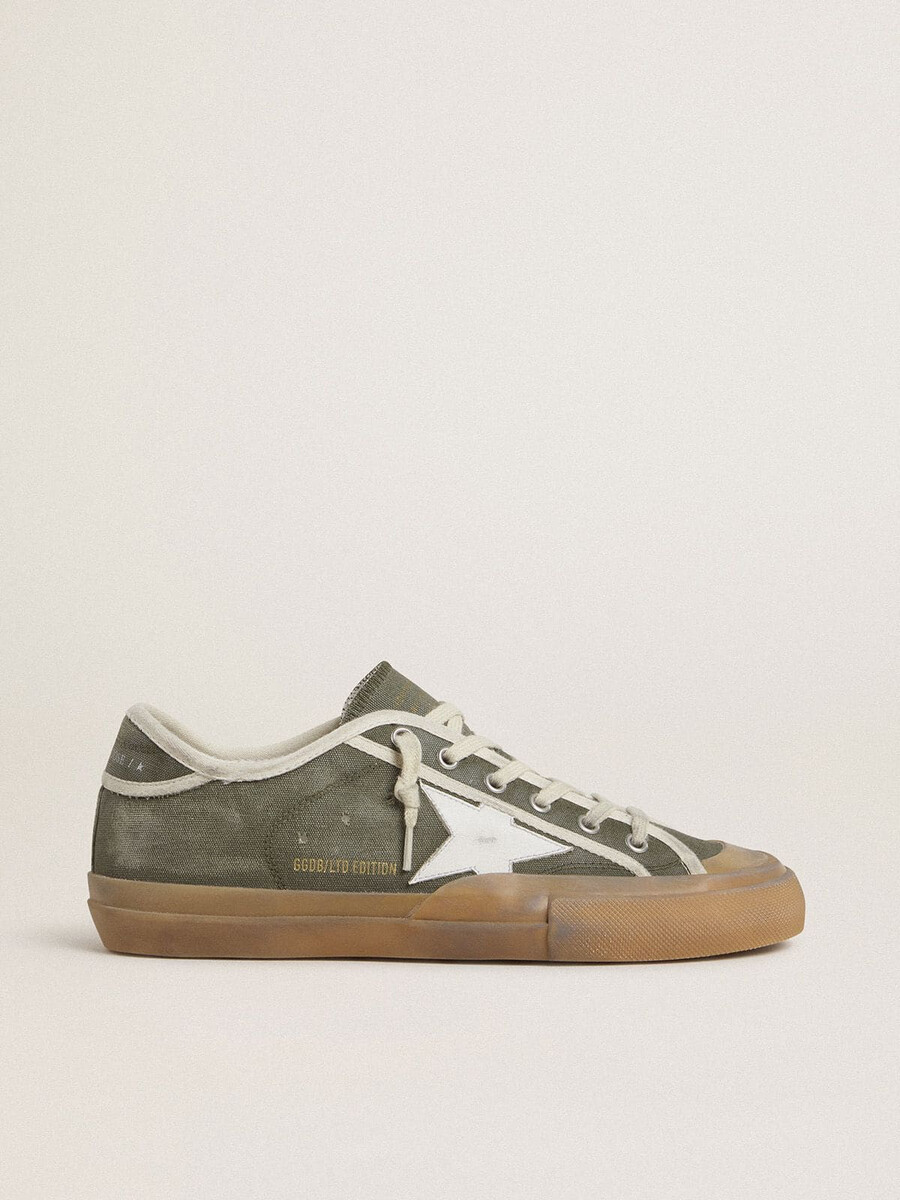 dames super-star ltd in groen canvas met witte leren ster