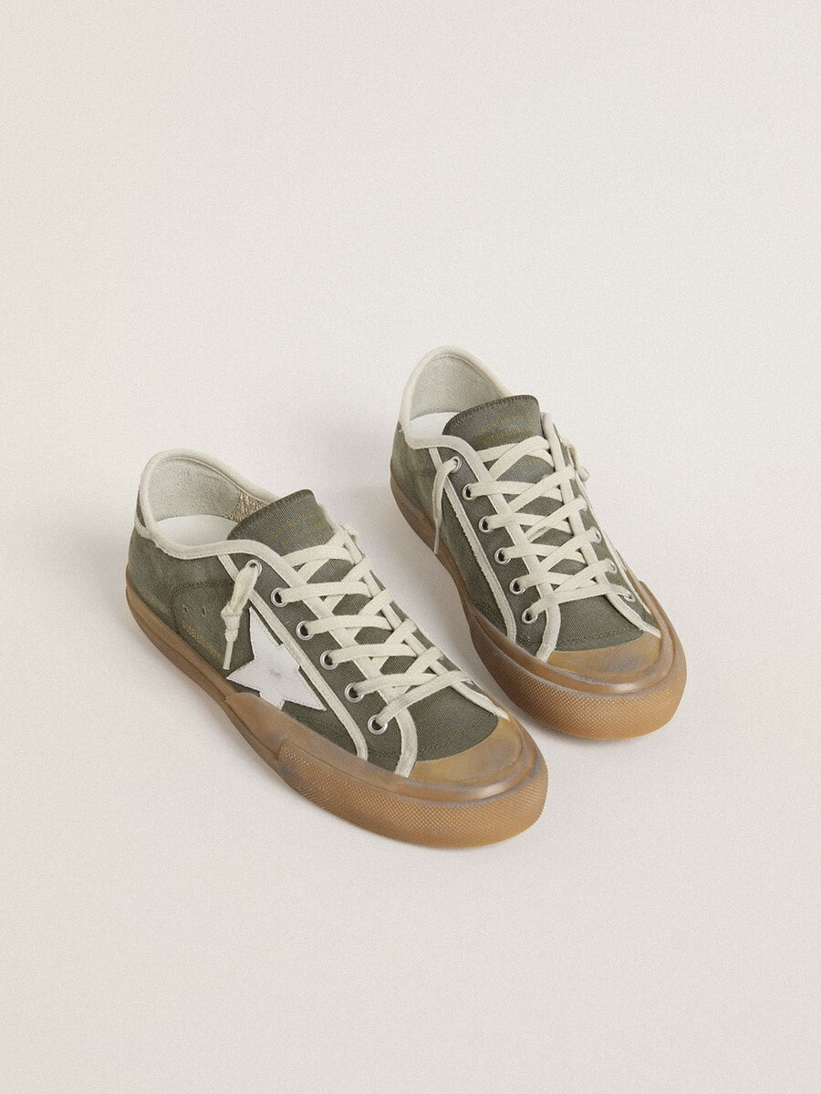 dames super-star ltd in groen canvas met witte leren ster