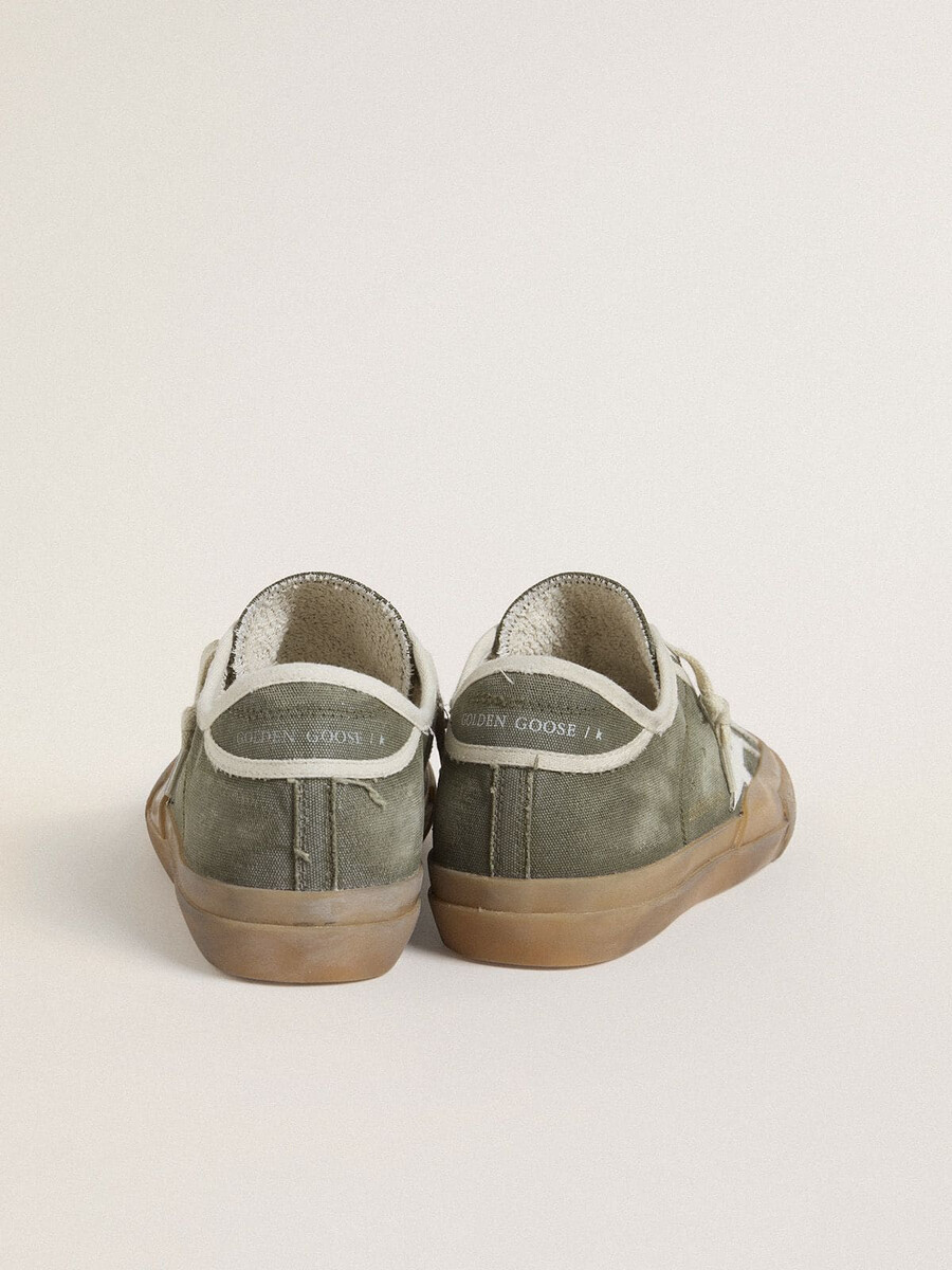 dames super-star ltd in groen canvas met witte leren ster