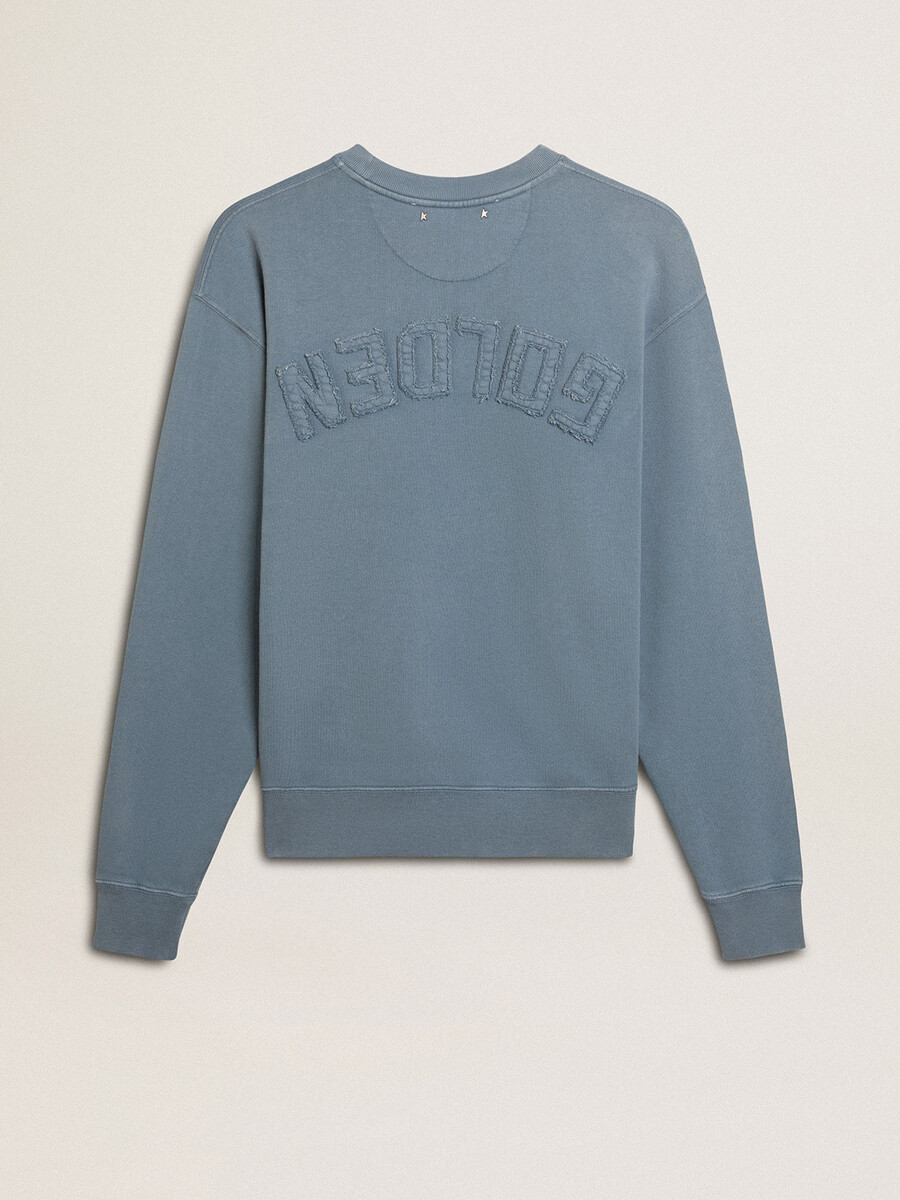 lichtblauwe sweater met omgekeerd logo op de achterkant - jersey capsule
