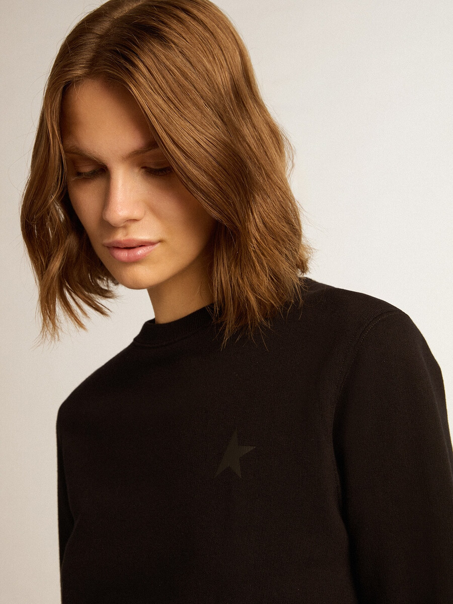 zwarte athena star collection-sweatshirt met een ton-sur-ton ster op de voorkant.