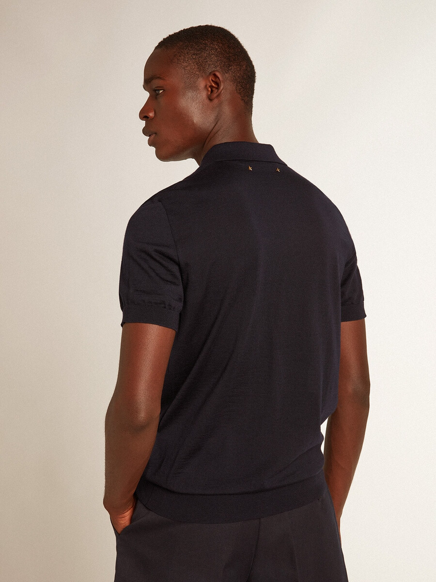 polo shirt met korte mouwen voor heren gemaakt van marineblauwe merinowol.