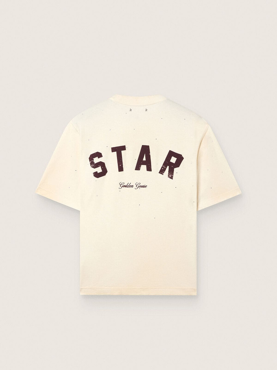 unisex t-shirt met sterrenmotief in wit katoen met een all-over kristalprint en een print op de achterkant.