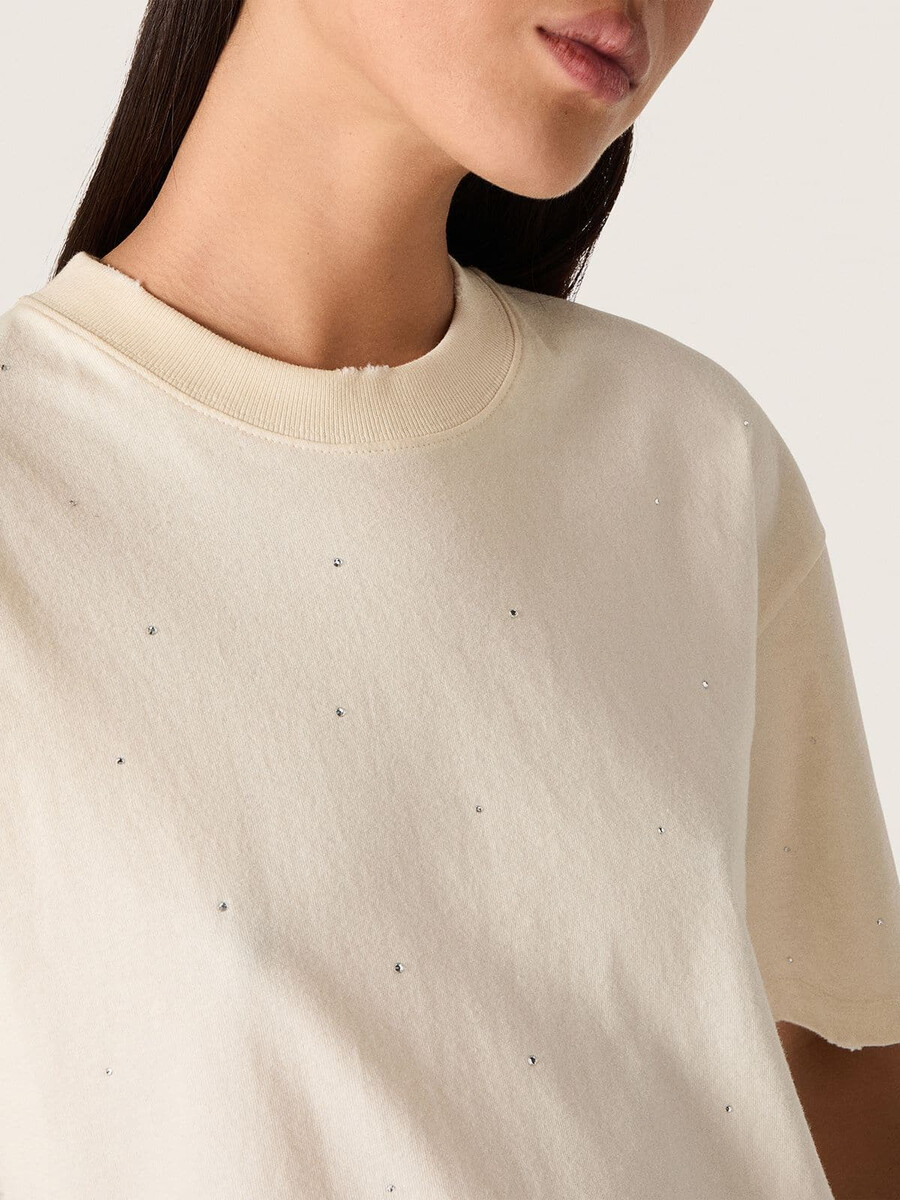 unisex t-shirt met sterrenmotief in wit katoen met een all-over kristalprint en een print op de achterkant.