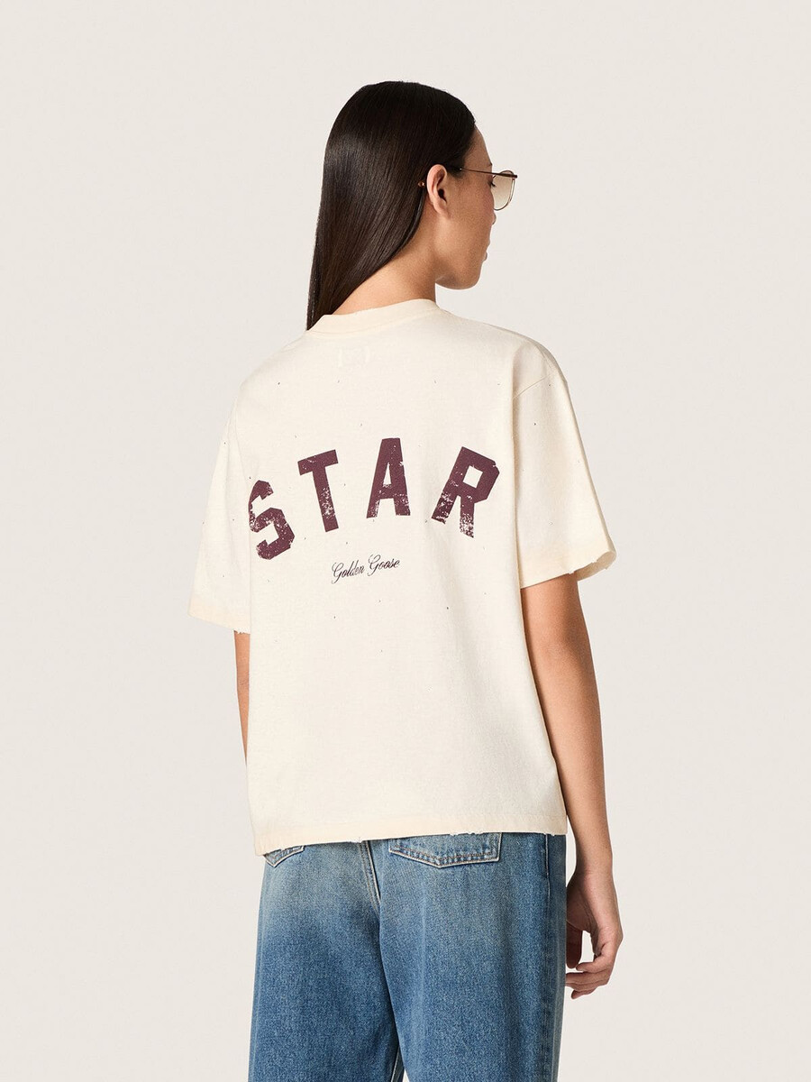 unisex t-shirt met sterrenmotief in wit katoen met een all-over kristalprint en een print op de achterkant.