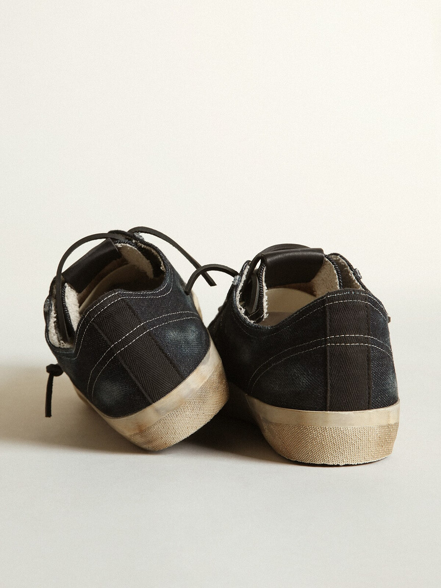 v-star sneakers in middernachtblauw denim met zwarte leren ster en neus