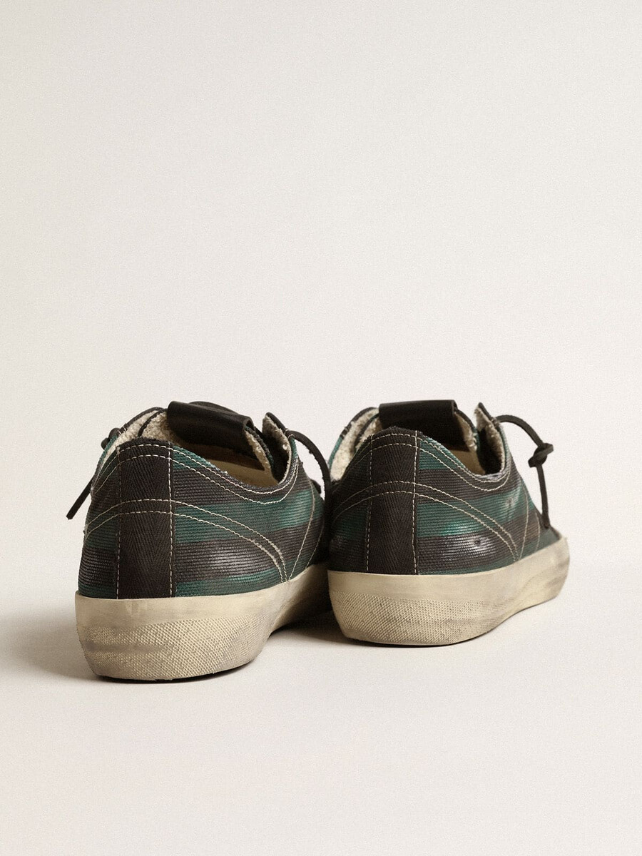heren v-star in zwart en groen gestreept canvas met zwarte leren ster en neus.