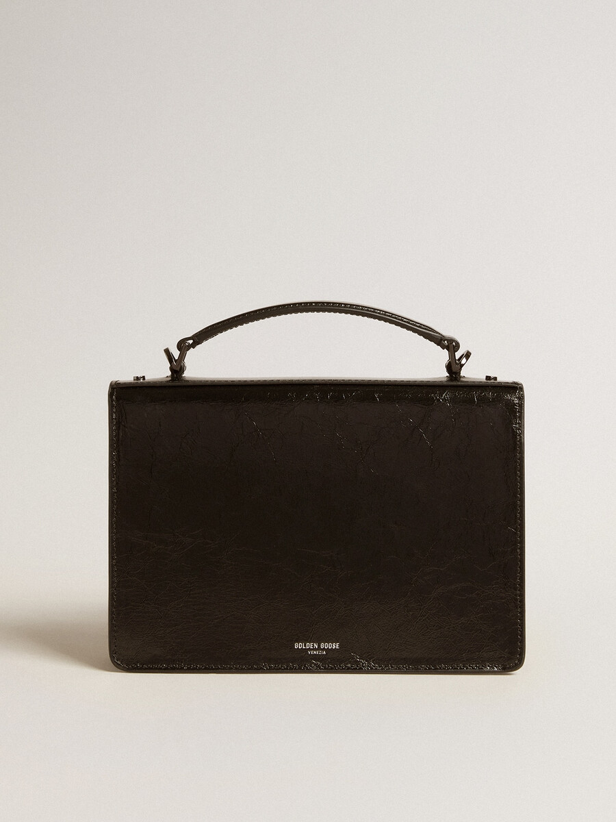 venezia-tas van zwart metallic leer met zwarte details.