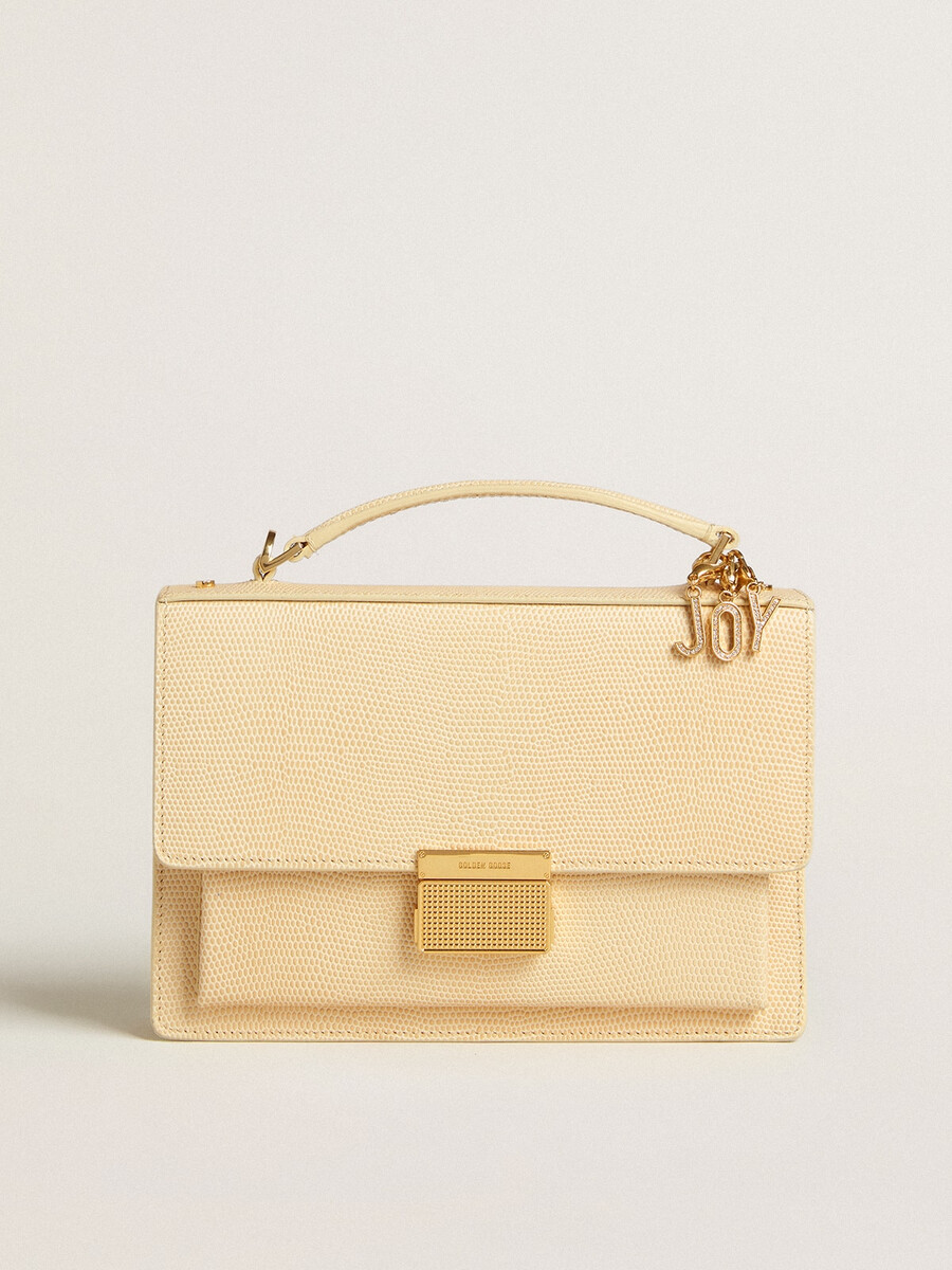 venezia-tas in beige leer met pythonprint en gouden details.